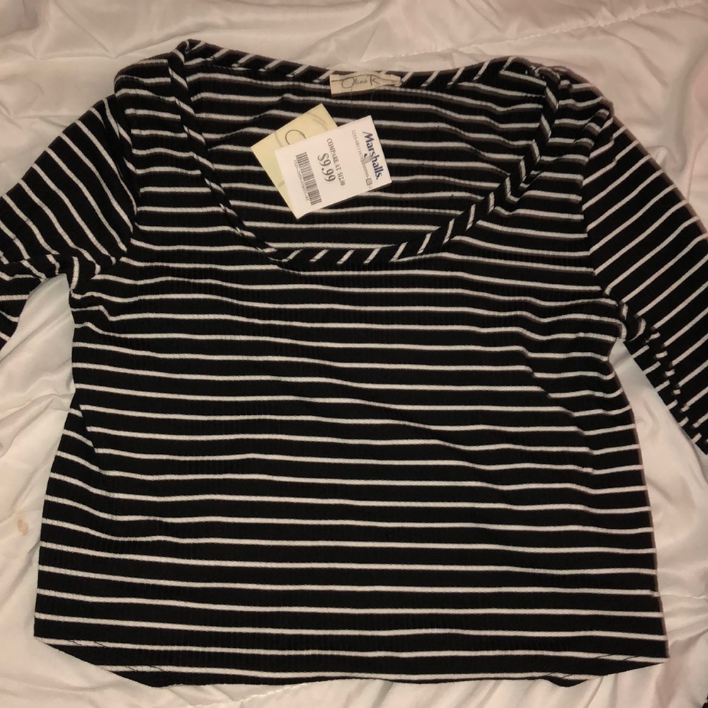 a black and white shirt cropped
